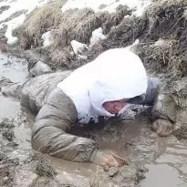 Nike puffer jacket mud bath